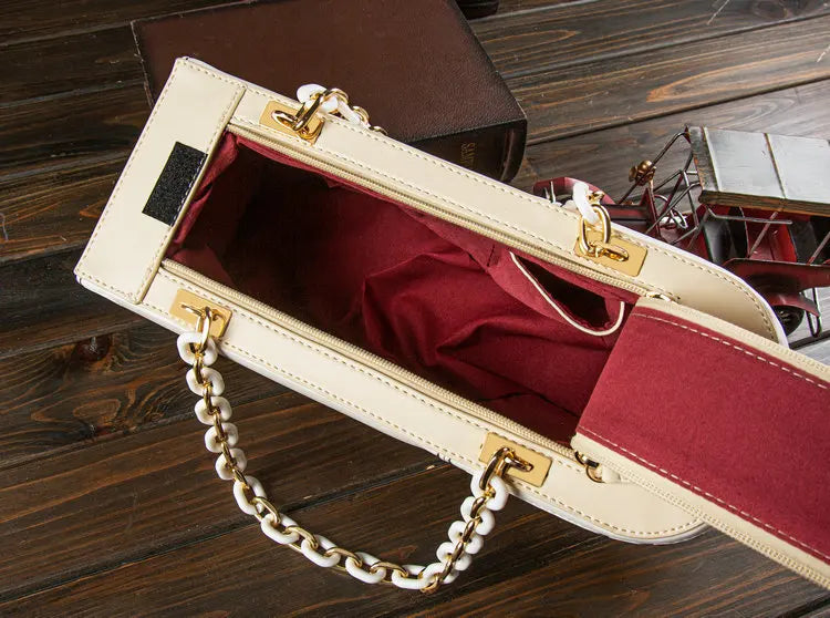 Nova personalidade original forma de ônibus design bolsa feminina rebites e diamantes bonito gráfico impresso corrente de metal bolsa feminina
